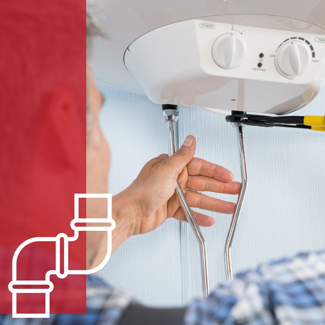 contractor fixing a tankless water heater
